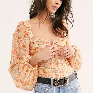 Free people Mabel long sleeve lace up orange top